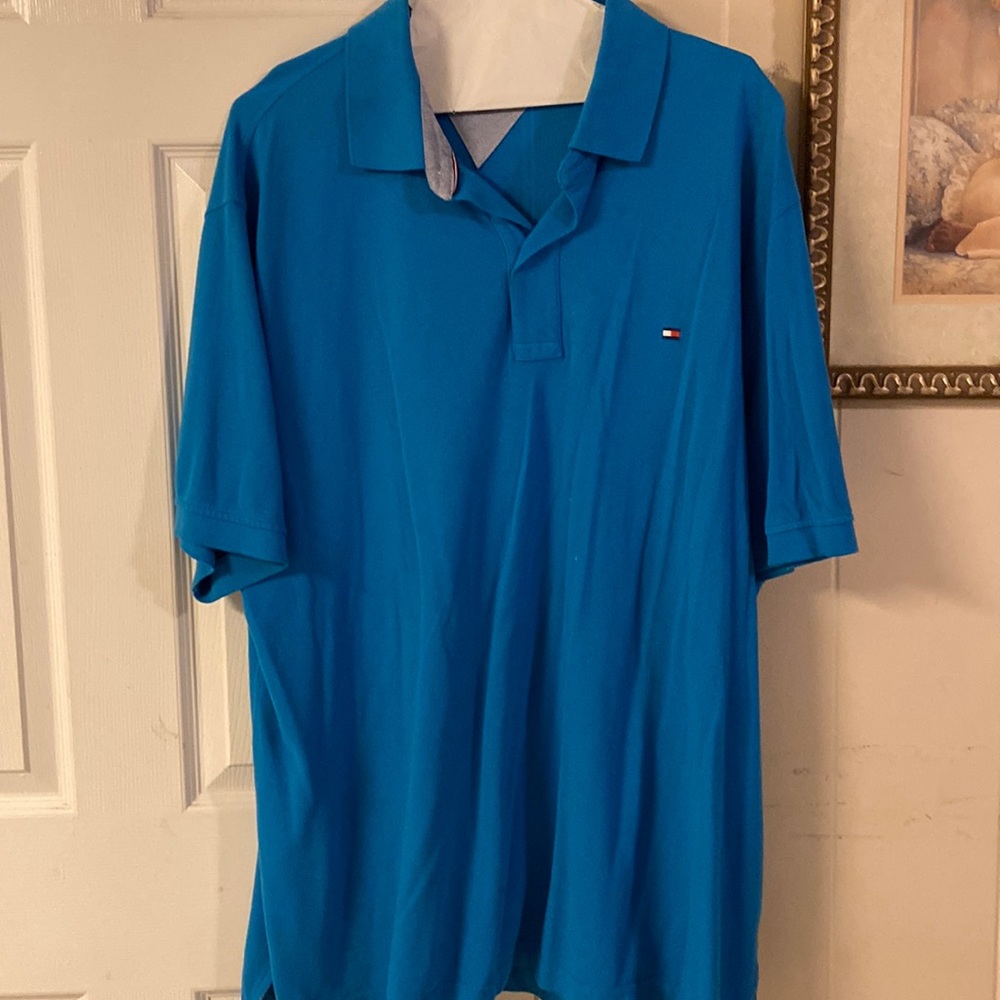 Polo two button teal color shirt with a collar. Size 3X AL.